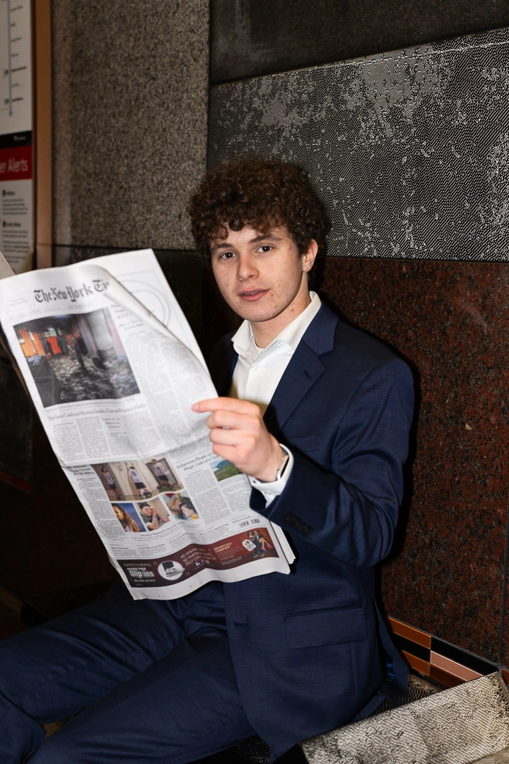 Jonah Kessler-Cohen nonchalantly waiting for the subway.